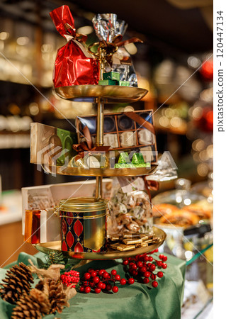 A stunning festive treat display showcased at a popular holiday market for all to enjoy A stunning festive treat display showcased at a popular holiday market for all to enjoy 120447134