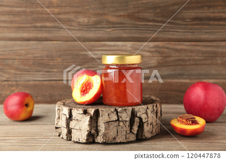 Assortment of jams, seasonal fresh berries and fruits on grey background. Assortment of jams, seasonal fresh berries and fruits on grey background. 120447878