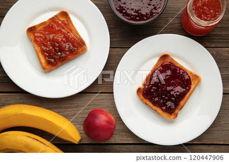 Sweet toasts with jam and fruit for breakfast, horizontal Sweet toasts with jam and fruit for breakfast, horizontal 120447906