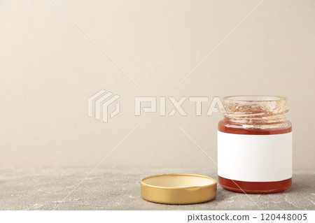 Jam jars mock-up. Jars with blank label on grey with copy space. 120448005