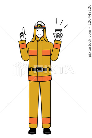 身穿消防服的消防員拿著計算機並指著 120448126
