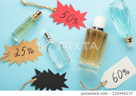 Set of perfume for sale on Black Friday on blue background. Set of perfume for sale on Black Friday on blue background. 120448137
