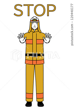 一名身穿消防服的消防員將手伸出身體前方示意停止。 120448177
