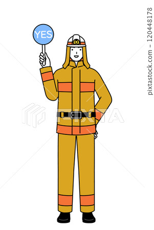 A firefighter in a fire suit holding a yes stick to indicate the correct answer 120448178