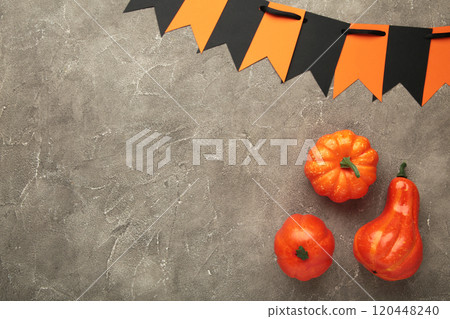 Halloween composition with pumpkins on grey background. View from above. 120448240