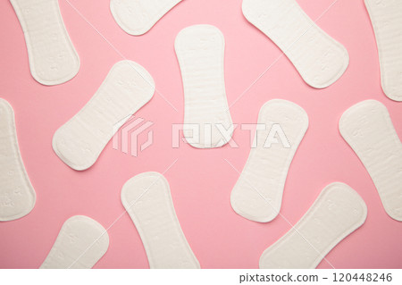 Menstruation cycle, feminine hygiene and protection, sanitary pad on pink background, top view, flat layout 120448246