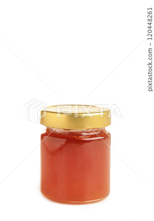 Peach jam jar isolated on white background. 120448261