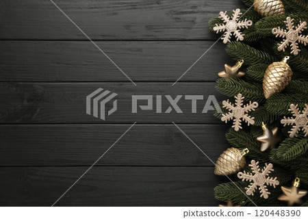 Christmas or New Year gold decoration on black background. Christmas or New Year gold decoration on black background. 120448390
