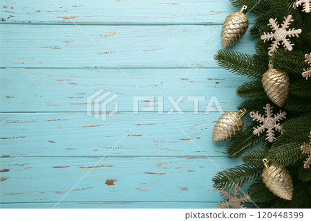 Christmas or New Year gold decoration on blue background. 120448399