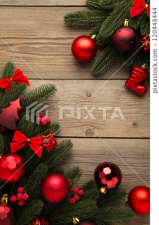 Christmas or New Year red decoration on grey background. Vertical photo 120448444