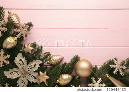 Christmas or New Year gold decoration on pink background. 120448485