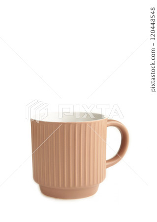 Beige cup isolated on a white background Beige cup isolated on a white background 120448548