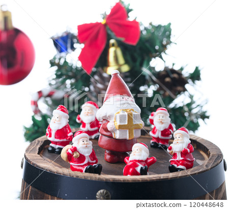Seven Santas on an oak barrel (Christmas image) Seven Santas on an oak barrel (Christmas image) 120448648