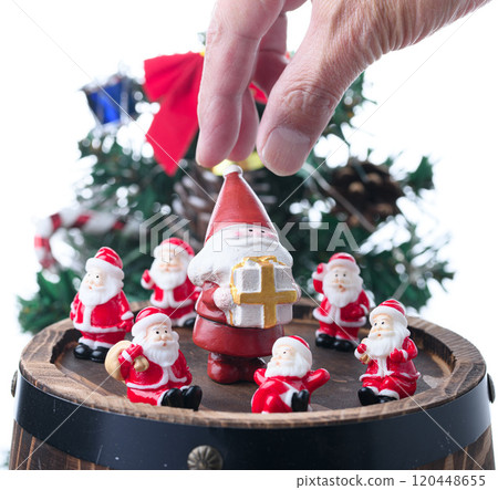 Seven Santas on an oak barrel (Christmas image) 120448655