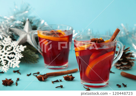 Mulled wine with cinnamon and anise stars on blue background. Thanksgiving Day Mulled wine with cinnamon and anise stars on blue background. Thanksgiving Day 120448723