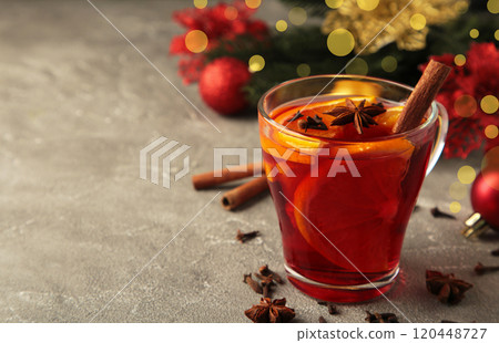 Mulled wine with cinnamon and anise stars on grey background. Thanksgiving Day Mulled wine with cinnamon and anise stars on grey background. Thanksgiving Day 120448727