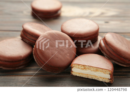 Choco pie chocolate coated snacks on brown background. Choco pie chocolate coated snacks on brown background. 120448798