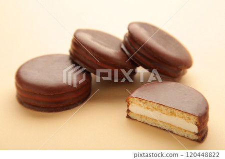 Choco pie chocolate coated snacks on beige background. 120448822