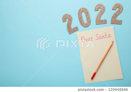Letter to Santa Claus with number 2022 on blue background. Inscription Dear Santa. Letter to Santa Claus with number 2022 on blue background. Inscription Dear Santa. 120448846