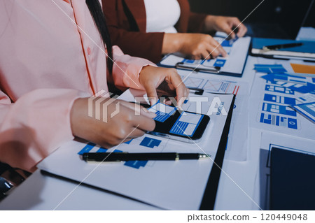 Young Asian business creative team work together, mobile application software design project. Brainstorm meeting, internet technology, smartphone web app designer, office coworker teamwork concept 120449048