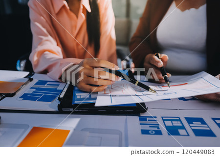 Young Asian business creative team work together, mobile application software design project. Brainstorm meeting, internet technology, smartphone web app designer, office coworker teamwork concept 120449083