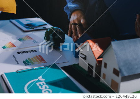 ESG environmental social governance display on laptop on eco-friendly company meeting with business people implementing environmental protection for clean and sustainable future ecology. Trailblazing ESG environmental social governance display on laptop on eco-friendly company meeting with business people implementing environmental protection for clean and sustainable future ecology. Trailblazing 120449126