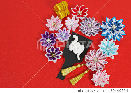 Material for New Year's cards for the year of the snake: Colorful tsumami zaiku, black shuttlecock, white snake and golden rice bag Material for New Year's cards for the year of the snake: Colorful tsumami zaiku, black shuttlecock, white snake and golden rice bag 120449594