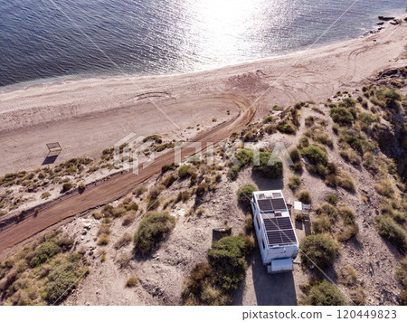 Caravan with solar panels on roof camp on sea, Spain. Aerial view. Caravan with solar panels on roof camp on sea, Spain. Aerial view. 120449823
