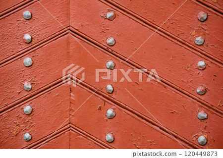 Old wooden background with metal rivets Old wooden background with metal rivets 120449873