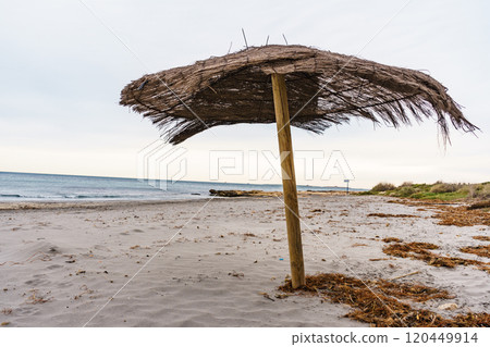 Shelter on beach. Cloudy weather 120449914