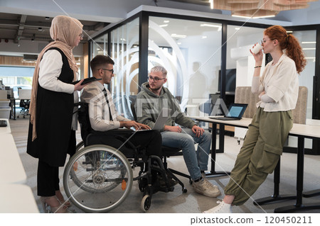 Young group of business people brainstorming together in a startup space, discussing business projects, investments, and solving challenges. 120450211