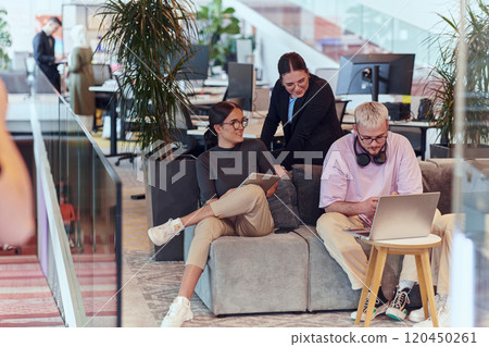 In a modern startup office, a diverse group of young professionals collaboratively tackles various business problems and challenges, surrounded by their engaged colleagues, fostering innovation and 120450261