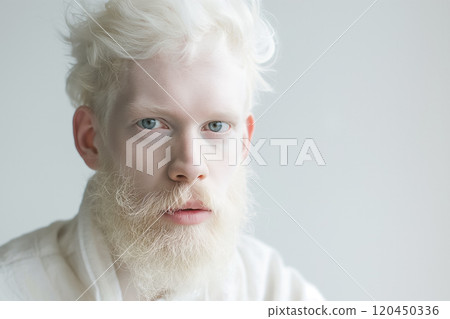 young albino man with white hair and beard, wearing white clothes on a white background, fashionable portrait young albino man with white hair and beard, wearing white clothes on a white background, fashionable portrait 120450336