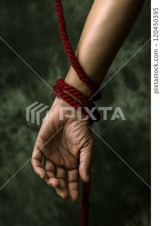 red rope symbolizing the struggle against aids red rope symbolizing the struggle against aids 120450395