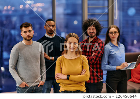 Portrait of successful creative business team looking at camera and smiling. Diverse business people standing together at startup. Selective focus Portrait of successful creative business team looking at camera and smiling. Diverse business people standing together at startup. Selective focus 120450644