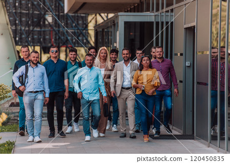 A diverse group of businessmen and colleagues walking together by their workplace, showcasing collaboration and teamwork in the company. A diverse group of businessmen and colleagues walking together by their workplace, showcasing collaboration and teamwork in the company. 120450835