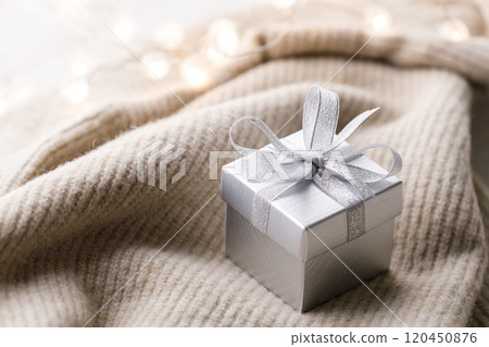 Artisan gift box on soft sweater 120450876