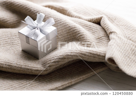 Artisan gift box on soft sweater 120450880