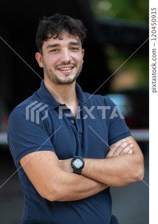 Portrait of a young successful entrepreneur in front of the company Portrait of a young successful entrepreneur in front of the company 120450915
