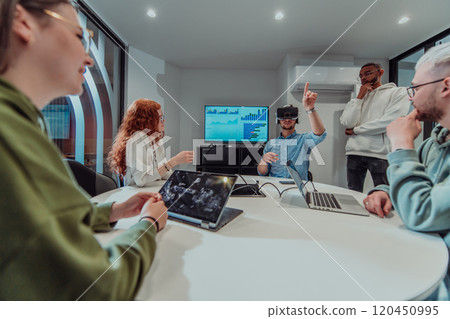 A diverse group of businessmen collaborates and tests a new virtual reality technology, wearing virtual glasses, showcasing innovation and creativity in their futuristic workspace 120450995