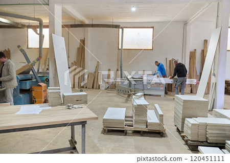 Interior of Wood Processing Industry Featuring CNC Cutting Machines and Wood Processing Equipment 120451111