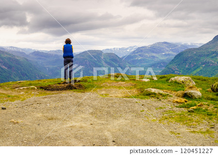 Tourist enjoy mountains view, Norway Tourist enjoy mountains view, Norway 120451227