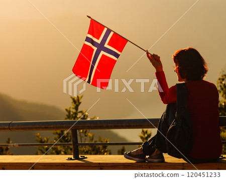 Tourist enjoy fjord view on Stegastein viewpoint Norway Tourist enjoy fjord view on Stegastein viewpoint Norway 120451233