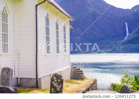 Wooden church in Nes village at fjord, Norway Wooden church in Nes village at fjord, Norway 120451273