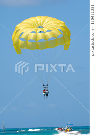 People are parasailing People are parasailing 120451381