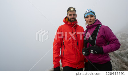 Runner couple having fun after trail cross-country trail running training Runner couple having fun after trail cross-country trail running training 120452391