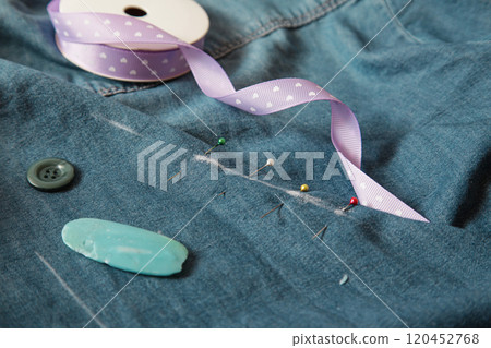 Pins, Chalk, Needles, Tape. Sewing accessories on jeans background. Use your pin as stitch. Pins, Chalk, Needles, Tape. Sewing accessories on jeans background. Use your pin as stitch. 120452768