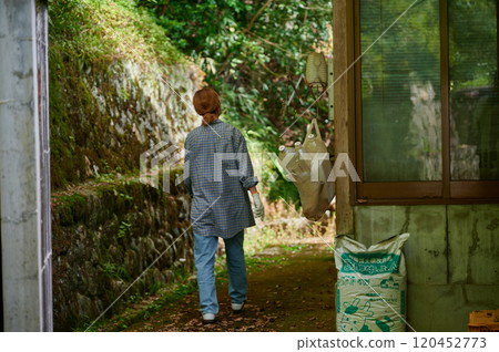 Backyard of an old house, moss, mountains, forest 120452773
