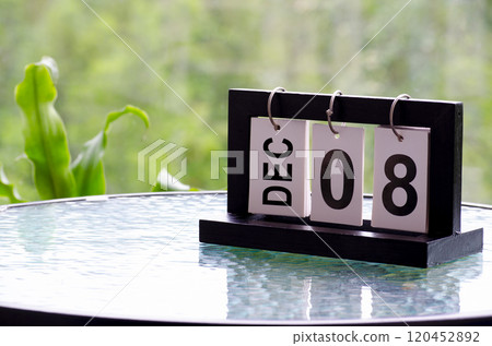 8 December calendar on marble table with customizable space for text. December calendar concept 120452892