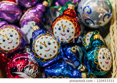 Christmas tree decorations on a store counter close-up 120453333